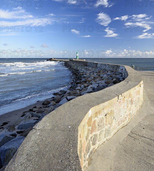 Mole with lighthouse in the harbour