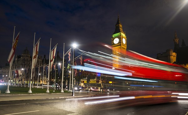 Red double-decker bus in front of Big Ben