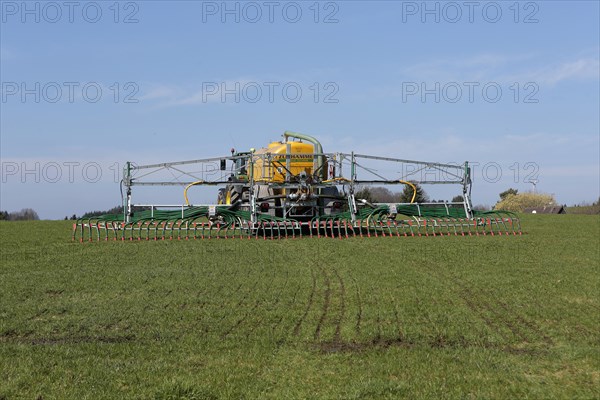 Liquid manure is spread on a field