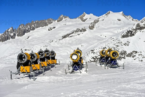 Snow cannons on ski slope