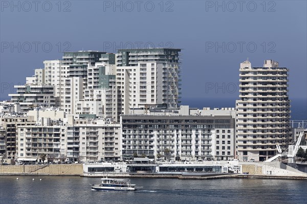 Spit of land with office and apartment buildings