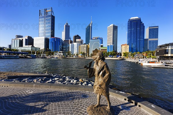 Sculpture of a woman with City skyline