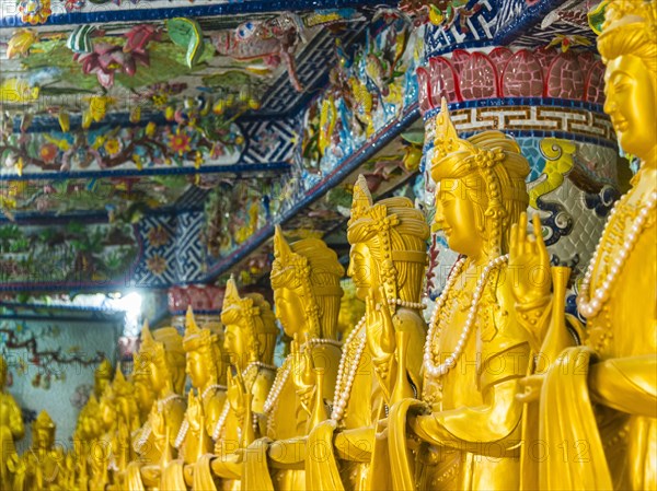 Golden standing Buddha statues