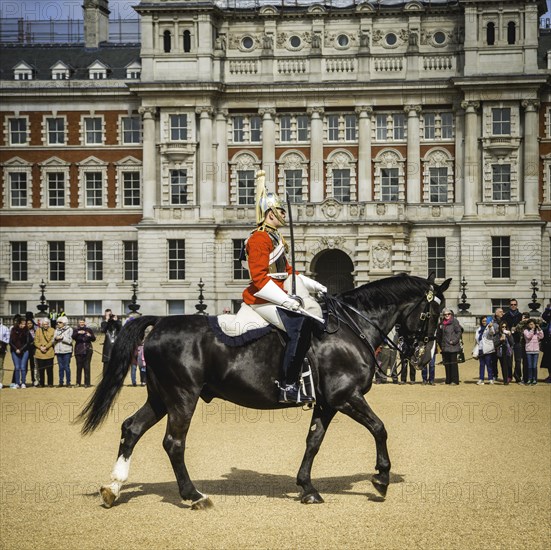 Royal Guard in red uniform on horse