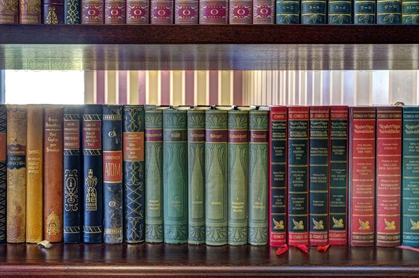 Hardcover books on shelf