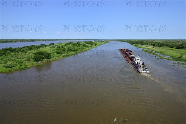 Pusher with iron ore cargo