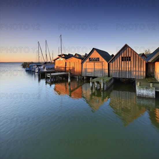 Boat houses in the harbour at Saaler Bodden