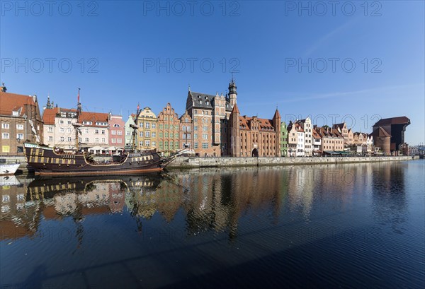 Row of houses in historic centre with ship