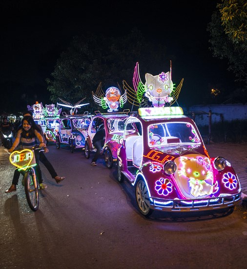 Colorful with LEDs illuminated cars