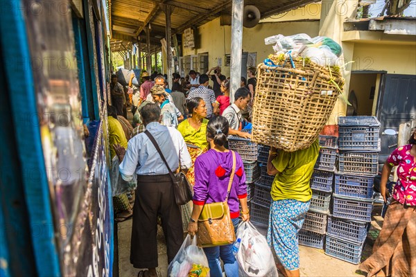 Locals boarding train on platform