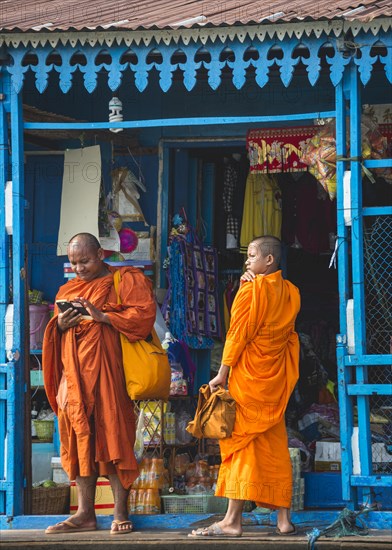 Buddhist Monks on Houseboat