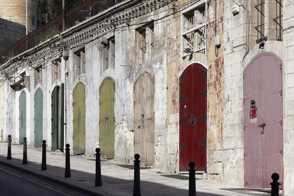 Old warehouse with colorful doors at Barriera Wharf