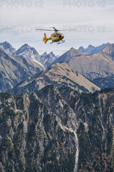 Mountain rescue by helicopter on the Fellhorn ridge
