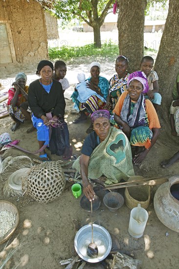 Women sitting under the village tree