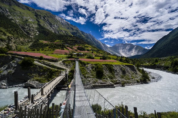 Two bridges are crossing the Marsyangdi river