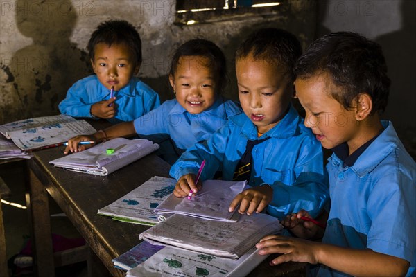 Children in blue dresses