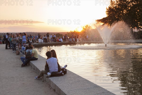 People enjoying the sunset at Debod Temple