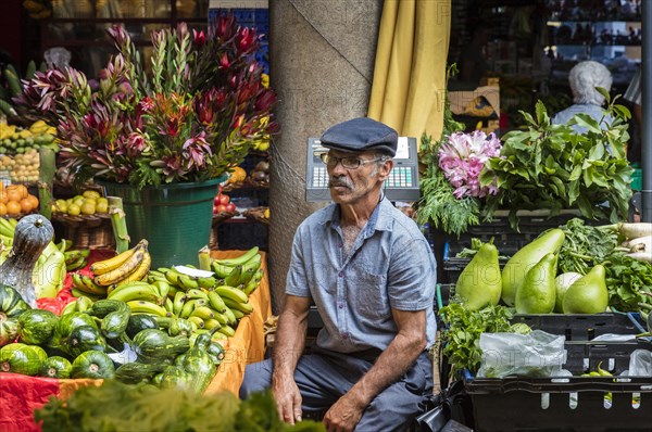 Grocer selling fruit