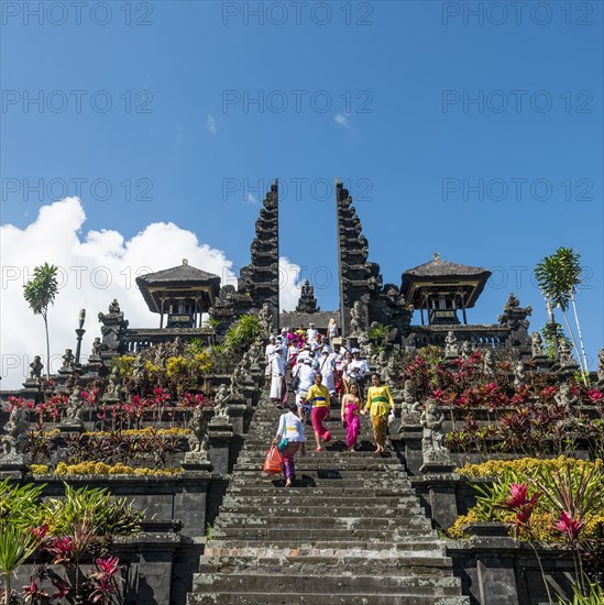 Devout Balinese descend stairs