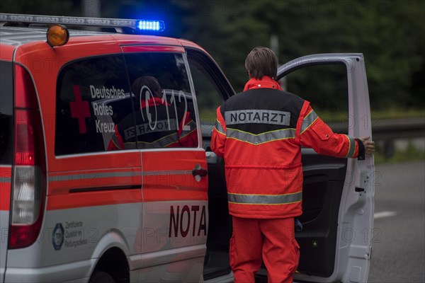 Emergency doctor in his emergency vehicle