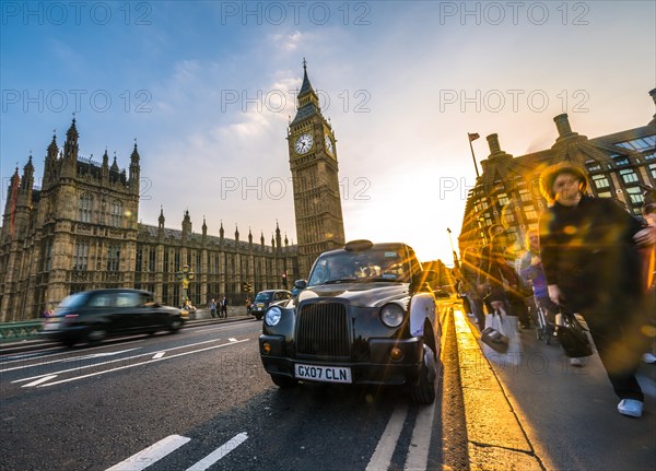 Black taxi in front of Big Ben