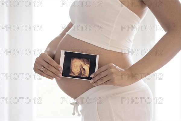 Woman in her ninth month pregnant