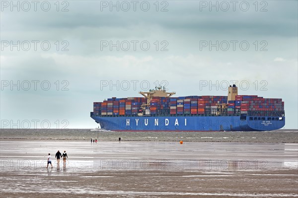 Container ship in channel