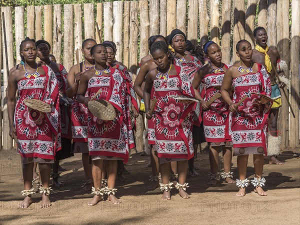 Women in traditional clothing during dance performance