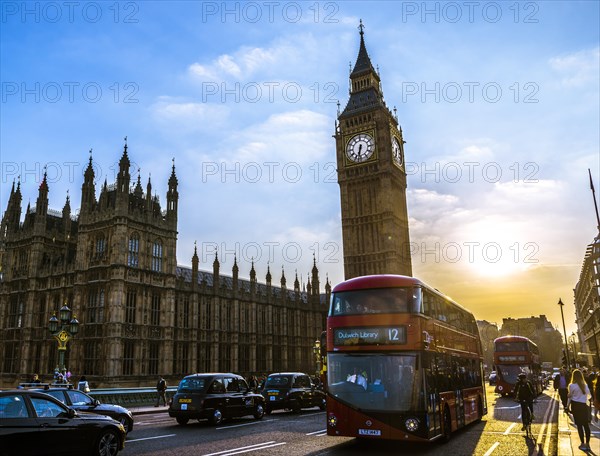 Red double decker bus in front of Big Ben