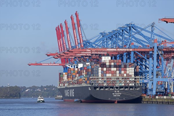 Loaded cargo ship in port