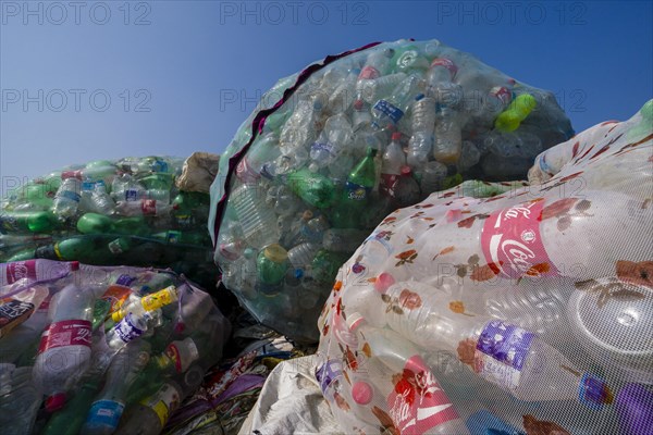 Big nets full of empty plastic bottles for recycling