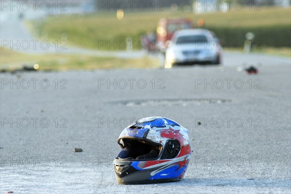 Motorcycle helmet on road