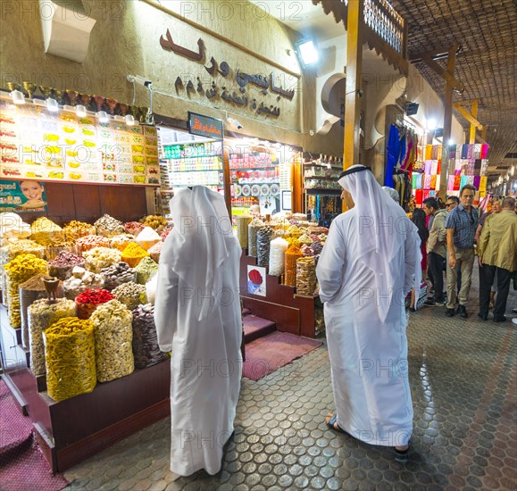 Two Arabs in white robes