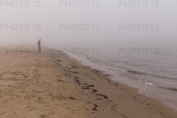 Lonely man on the beach at Mellbystrand