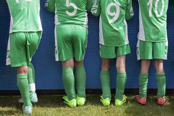 Four players of a youth football team