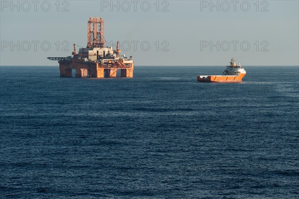 Supply vessel Normand Aurora next to West Phoenix oil rig