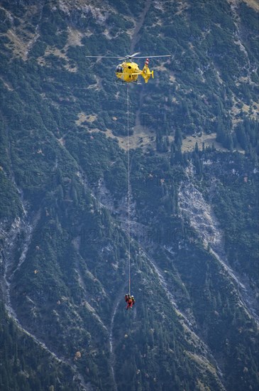 Mountain rescue by helicopter on the Fellhorn ridge