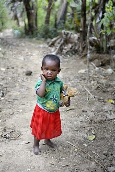 Little girl with teddy bear