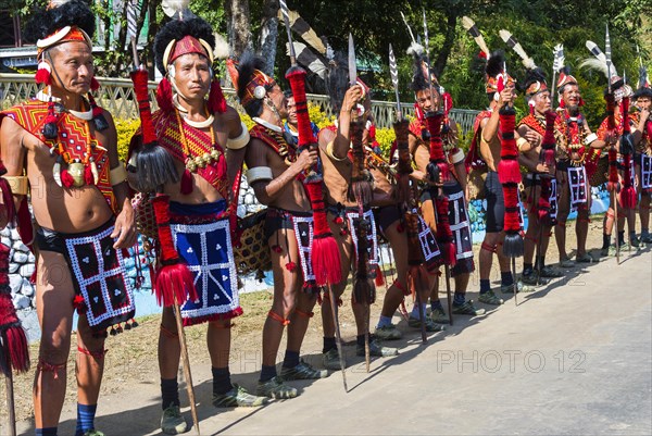 Naga tribal group performers standing in line to welcome the officials at the Hornbill Festival