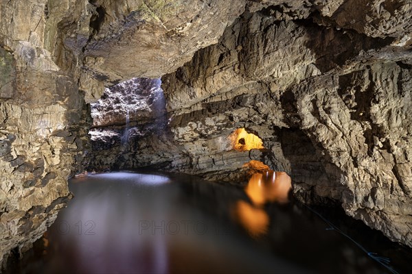 River Allt Smoo enters through a hole in the ceiling into the limestone cave Smoo Cave