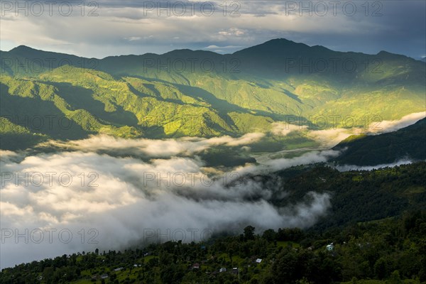 Fog is covering Phewa Lake in the morning