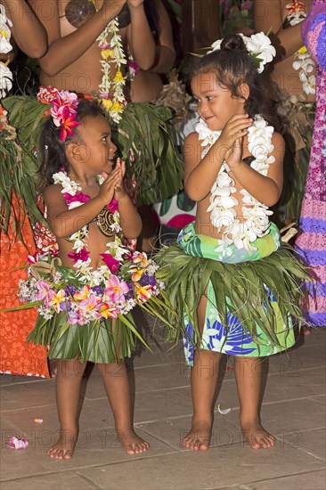 Little girls decorated with flowers