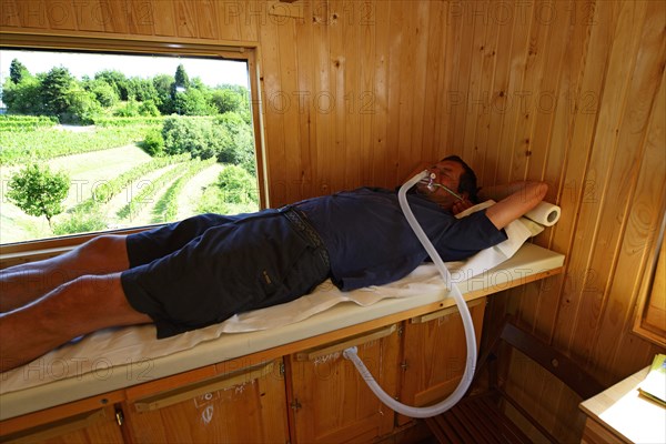 Man lying on a couch