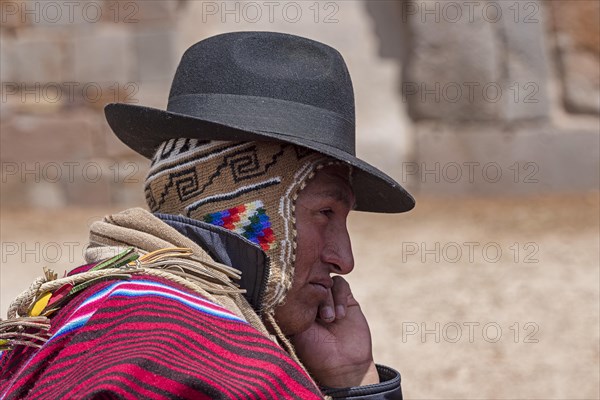 Indigenous man in typical national clothing with typical hat