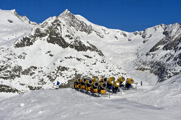 Snow cannons on ski slope