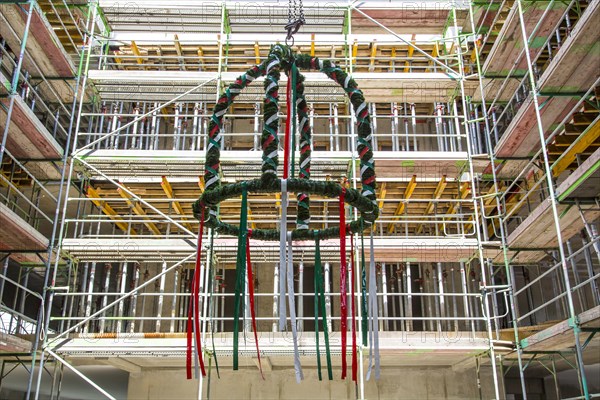 Topping-out ceremony in an office building