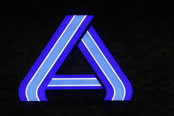 Illuminated company logo sign of the food discounter ALDI Nord