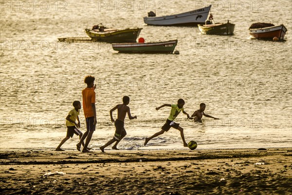 Teenager playing soccer