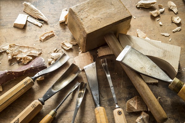 Various woodworking tools on a workbench