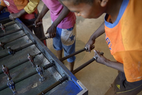 Boys play table football